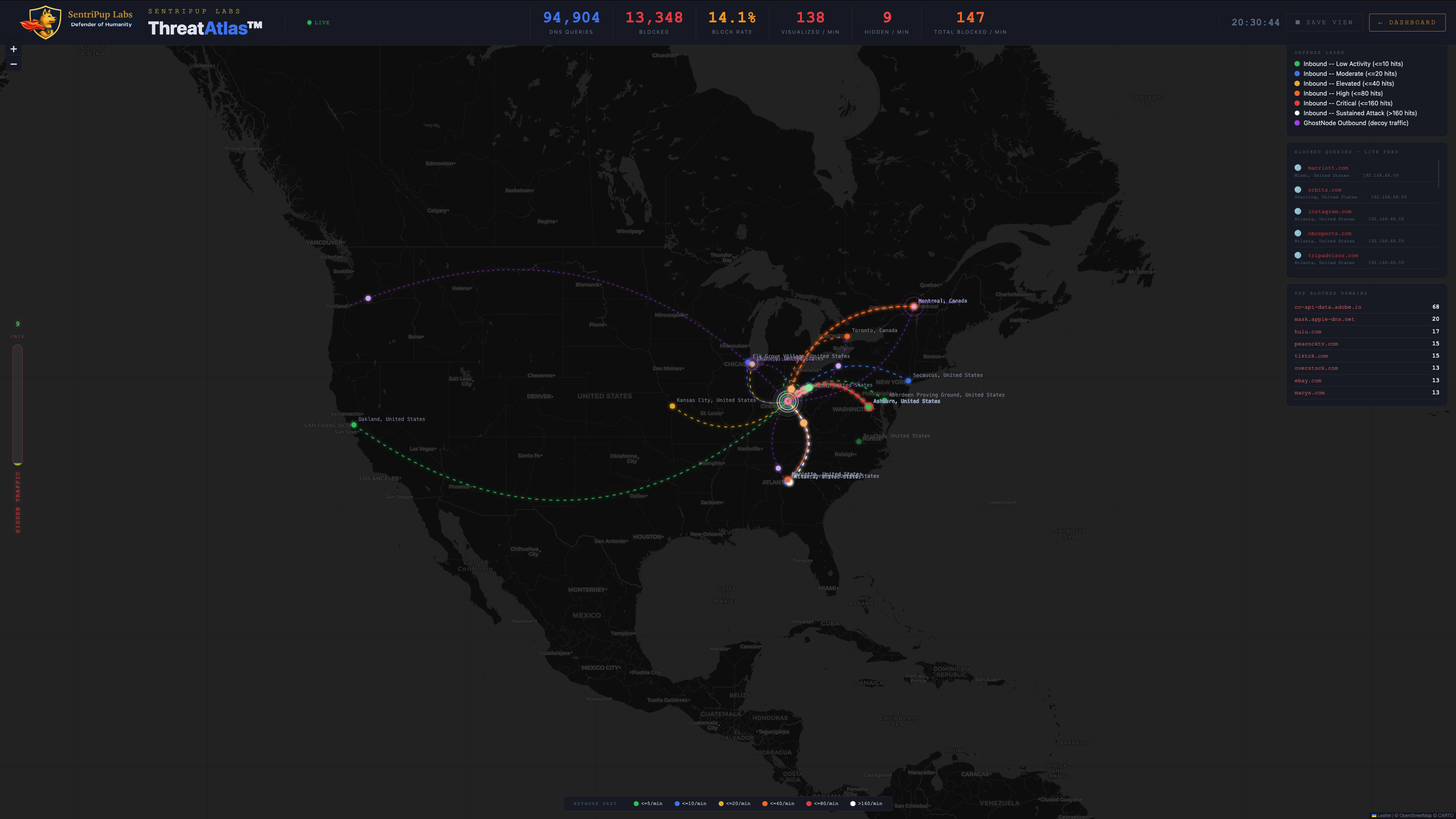 ThreatAtlas live map showing GhostNode purple decoy arcs looping across the United States -- ghost: homepoint.com and ghost: threadplus.com visible